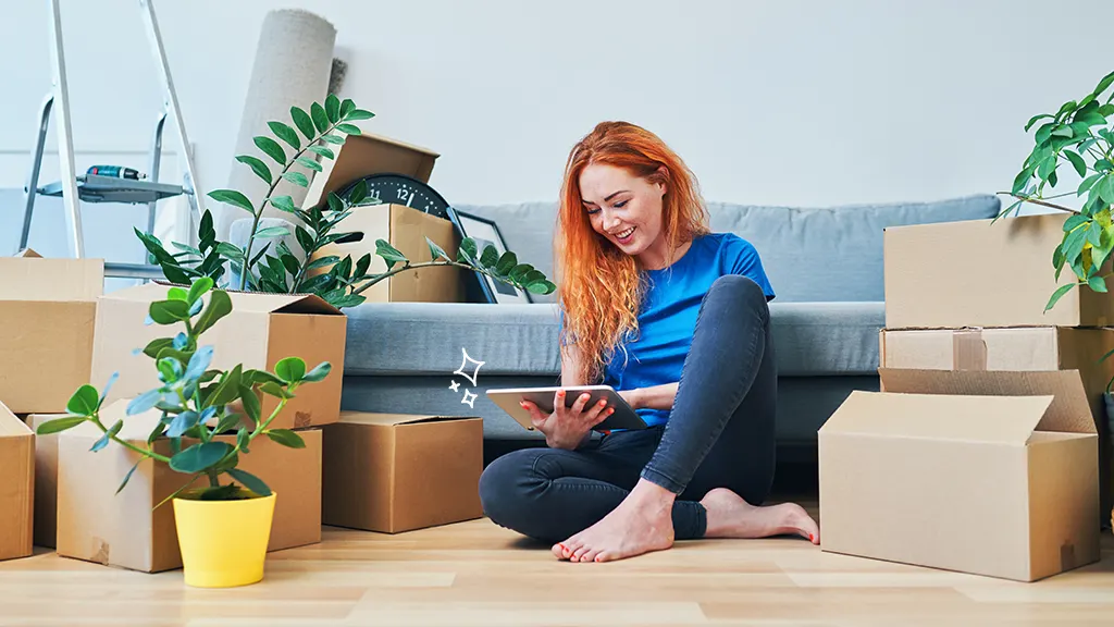 Woman in new home with smart tech